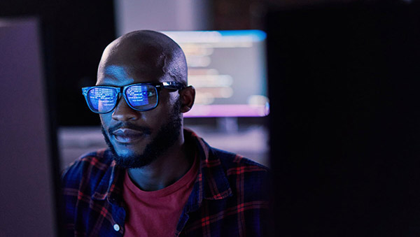Man staring at computer screen
